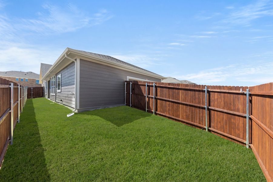 Front exterior of a new home in Heartland, Crandall, TX, highlighting curb appeal (Image 28). Front exterior of a new home in Heartland, Crandall, TX, highlighting curb appeal (Image 28).