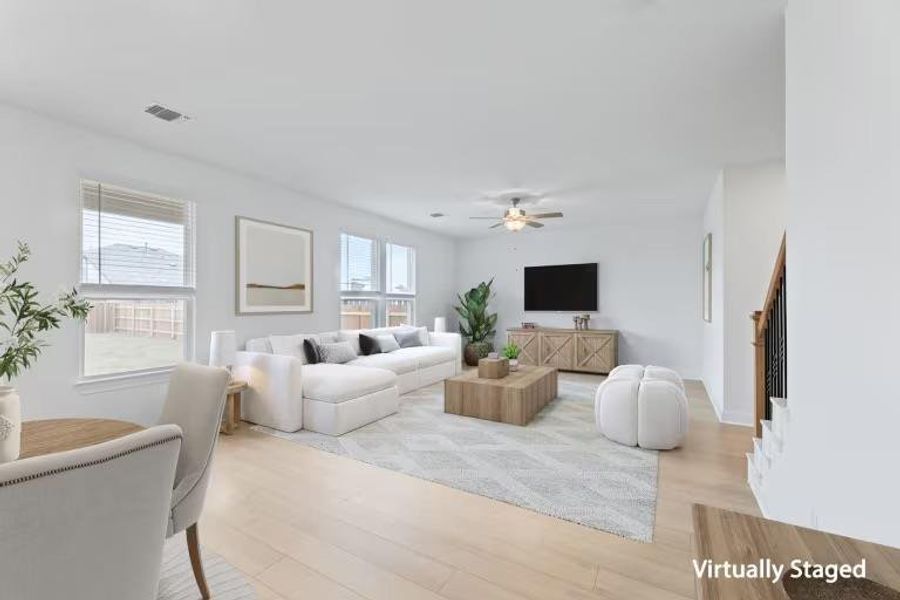 Photo of Pulte model home with same floor plan, not of actual home listed.