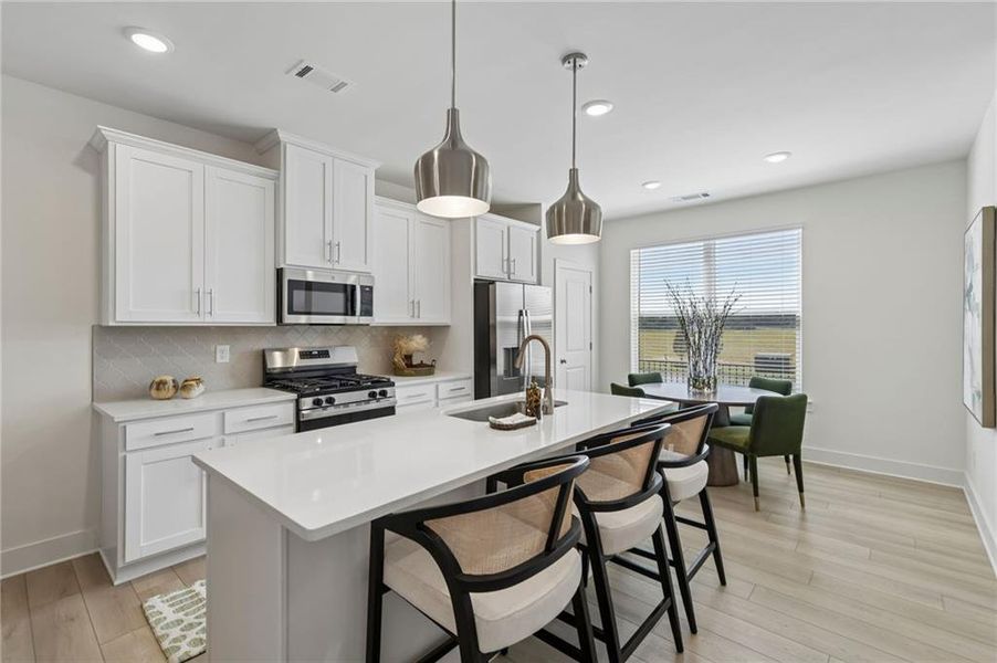 Furnished interior view inside a new home in Tribute, Hoschton (Image 18).