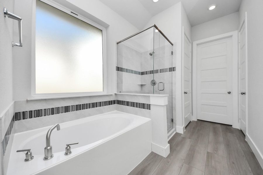 Furnished interior view inside a new home in Sunterra: Premier Collection, Katy (Image 3).