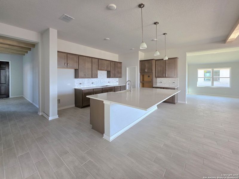 Furnished interior view inside a new home in The Heritage at Saddlebrook Ranch 70's, Schertz (Image 7).