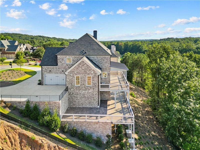 Front exterior of a new home in , Suwanee, GA, highlighting curb appeal (Image 27).