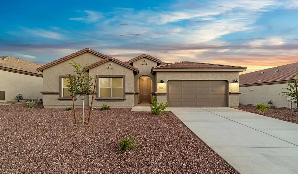 Front exterior of a new home in Sycamore Vista, Vail, AZ, highlighting curb appeal (Image 1). Front exterior of a new home in Sycamore Vista, Vail, AZ, highlighting curb appeal (Image 1).