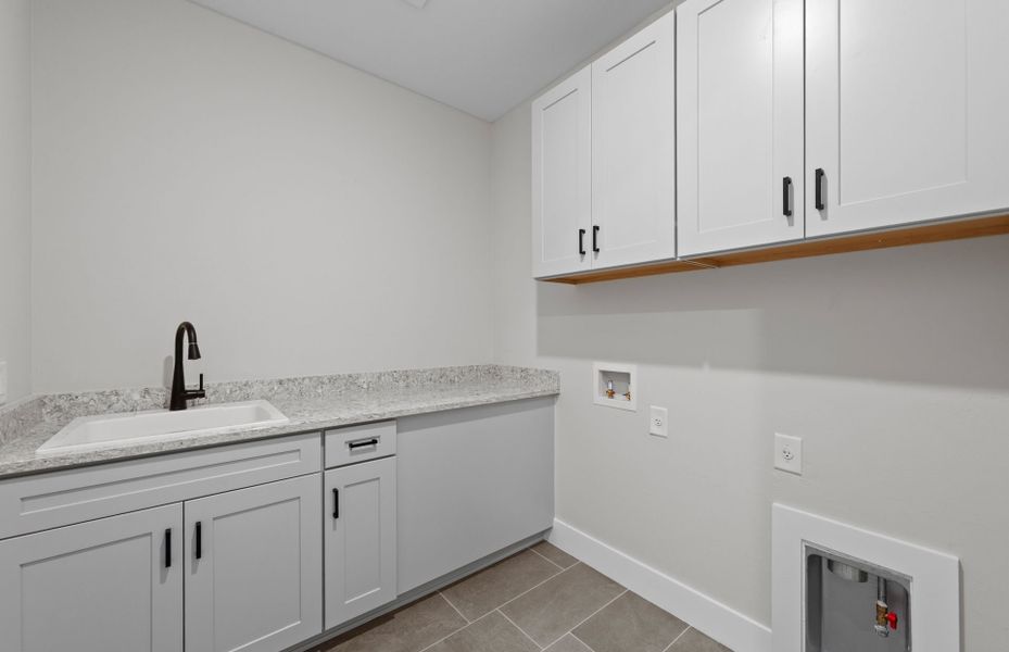 Representative furnished interior of a home built from the Upton by Pulte Homes in Reagan Landing, Bradenton (Image 11).