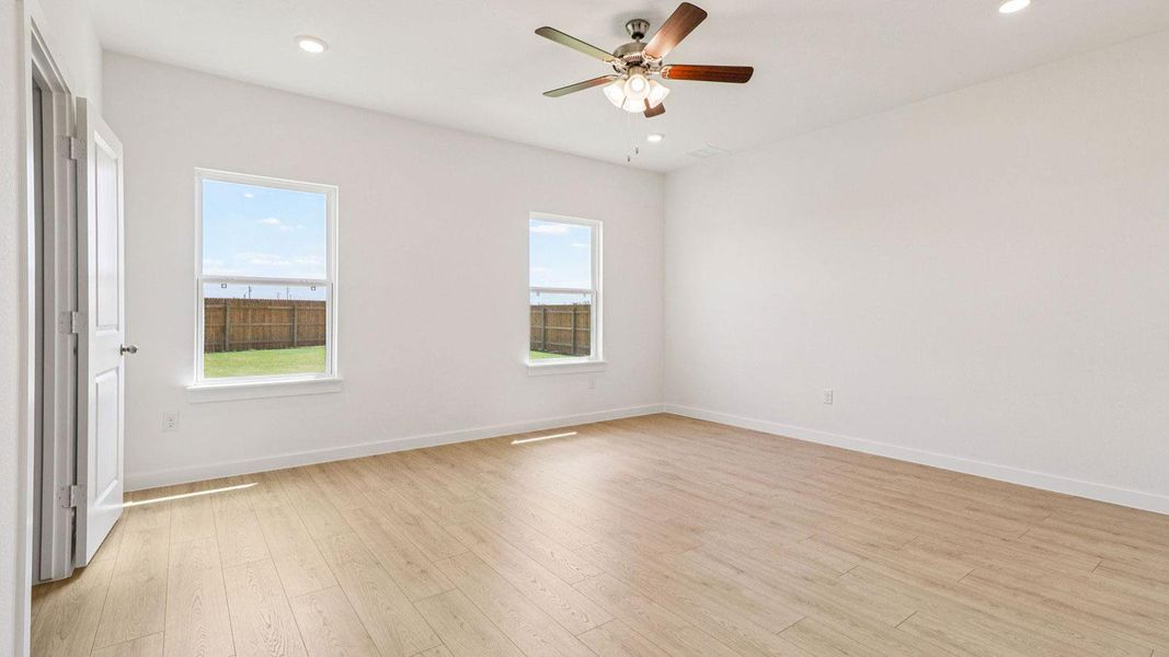 Spacious, unfurnished interior of a new home in Monarch Ranch, Manor (Image 11).