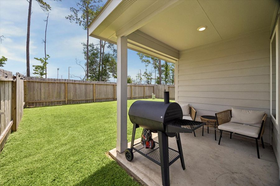 Exterior details and patio area of a home in , Spring (Image 22).