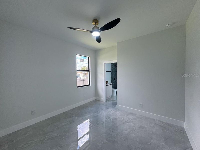 Spacious, unfurnished interior of a new home in , Port Charlotte (Image 20).