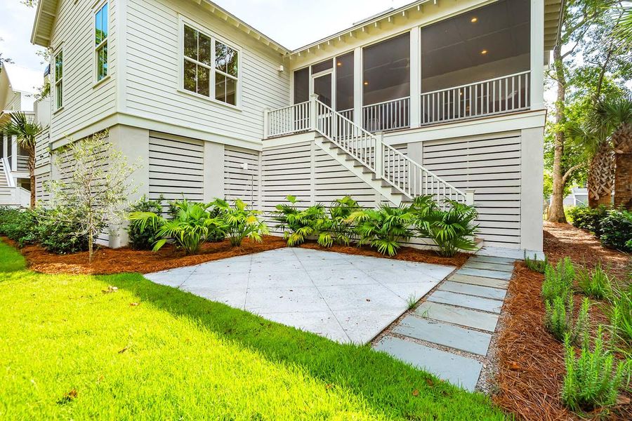 Exterior details and patio area of a home in , Johns Island (Image 25).