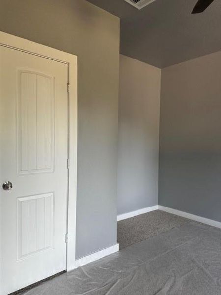 Unfurnished room with carpet floors