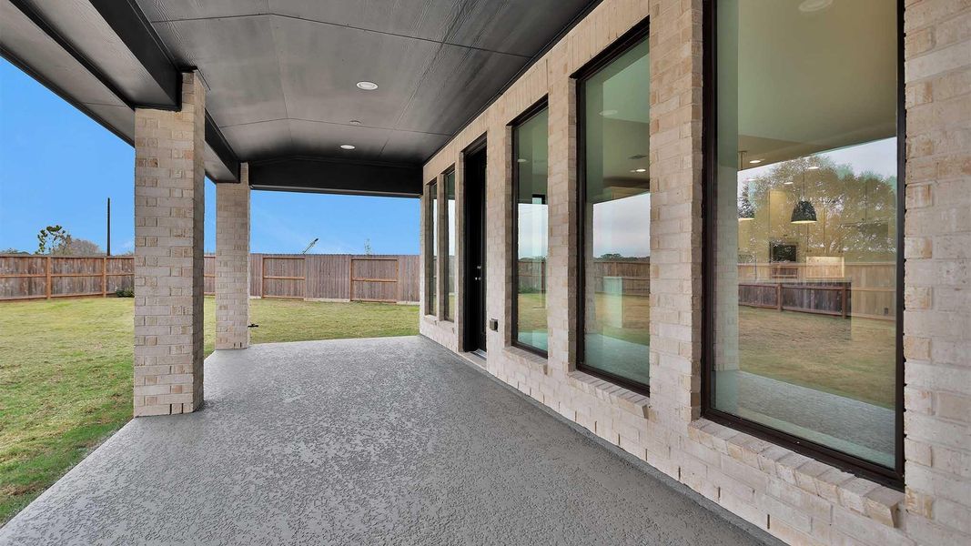 Exterior details and patio area of a home in Candela South, Richmond (Image 3).