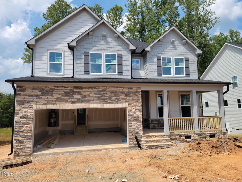 Front exterior of a new home in Stagecoach Corner, Mebane, NC, highlighting curb appeal (Image 2). Front exterior of a new home in Stagecoach Corner, Mebane, NC, highlighting curb appeal (Image 2).