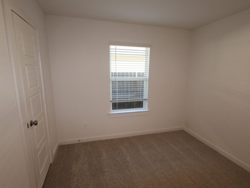 Spacious, unfurnished interior of a new home in Pinewood at Grand Texas, New Caney (Image 31).