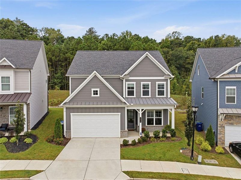 Front exterior of a new home in West Highlands, Atlanta, GA, highlighting curb appeal (Image 32). Front exterior of a new home in West Highlands, Atlanta, GA, highlighting curb appeal (Image 32).