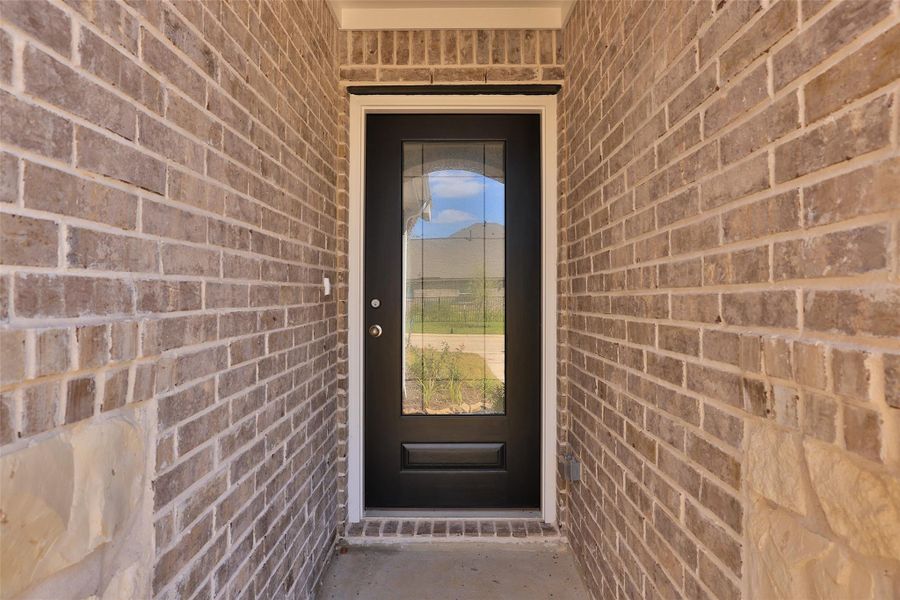 Exterior details and patio area of a home in The Woodlands Hills, Willis (Image 18). Exterior details and patio area of a home in The Woodlands Hills, Willis (Image 18).