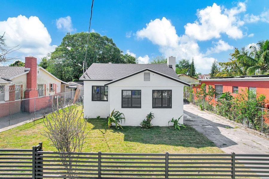 Front exterior of a new home in , Miami, FL, highlighting curb appeal (Image 18). Front exterior of a new home in , Miami, FL, highlighting curb appeal (Image 18).