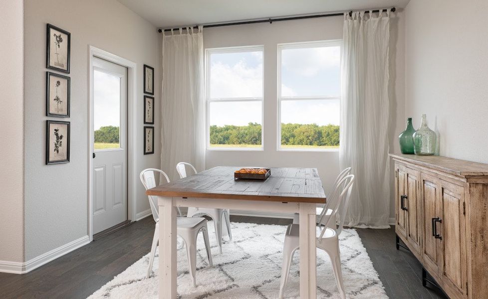 Representative furnished interior of a home built from the Lancaster by Ashton Woods in Willow Springs, Buda (Image 5).