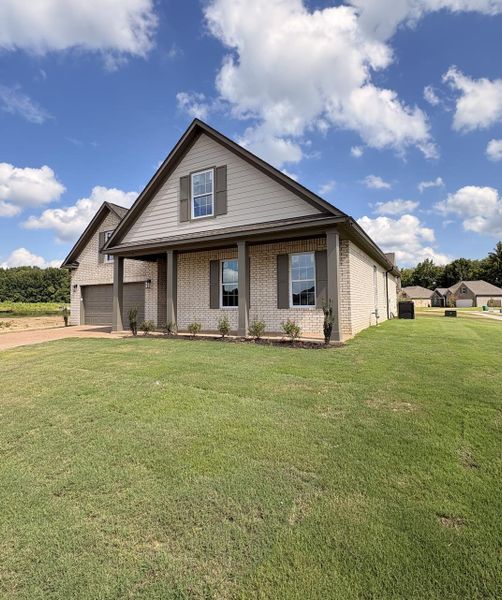 Brick and siding exterior with a covered porch Brick and siding exterior with a covered porch