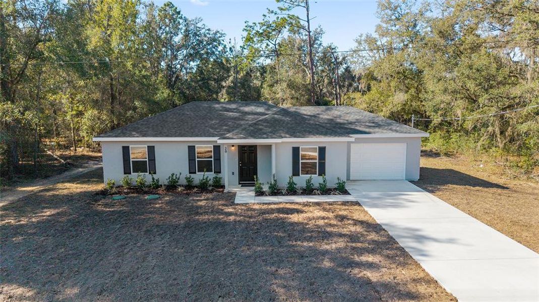 Front exterior of a new home in , Ocala, FL, highlighting curb appeal (Image 19).