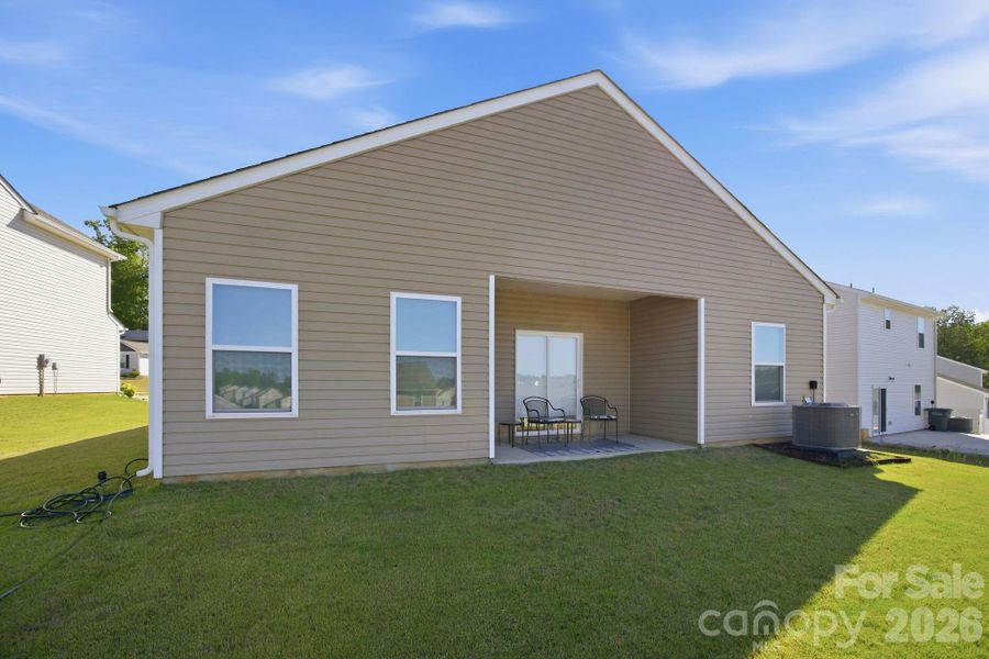 Exterior details and patio area of a home in Stagecoach Station, Gastonia (Image 23).