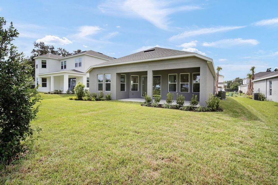 Exterior details and patio area of a home in Timber Ridge, Plant City (Image 2). Exterior details and patio area of a home in Timber Ridge, Plant City (Image 2).