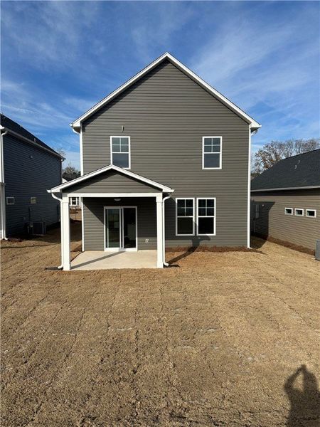 Exterior details and patio area of a home in Brownstone Park, Easley (Image 2). Exterior details and patio area of a home in Brownstone Park, Easley (Image 2).