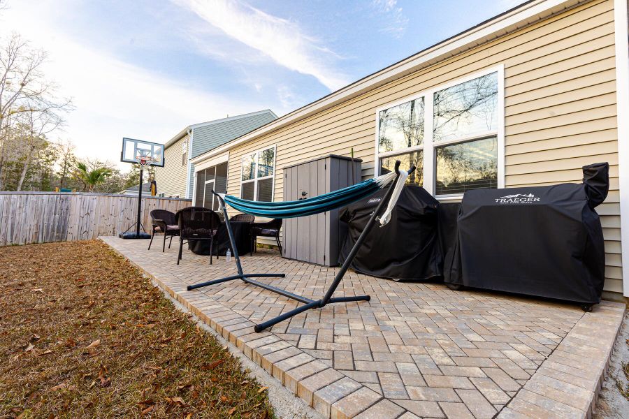 Exterior details and patio area of a home in Reserve at Mallard Crossing, Summerville (Image 4).