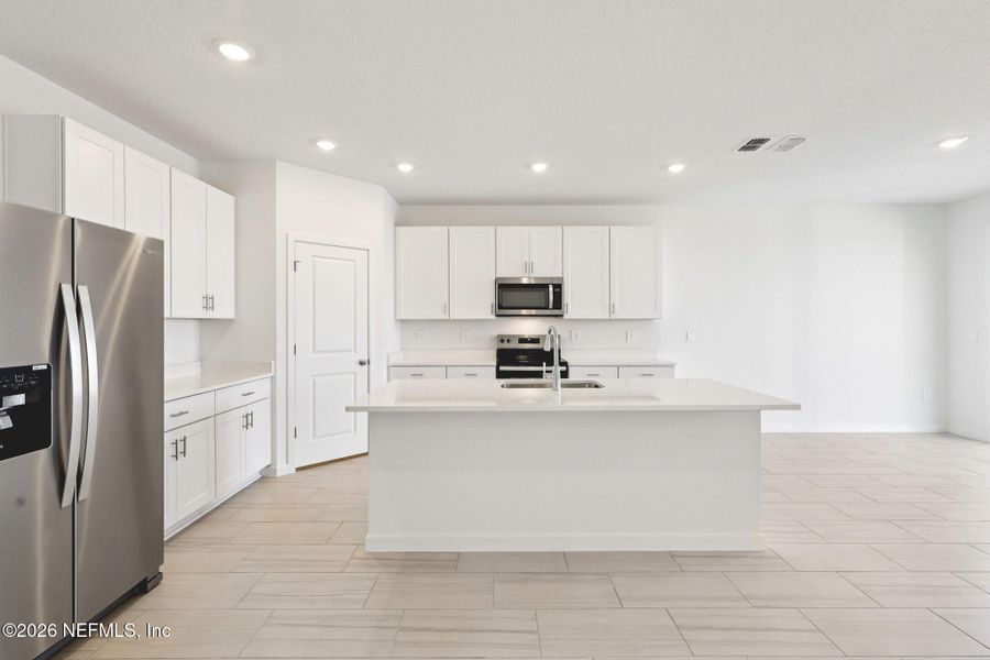 Furnished interior view inside a new home in Lakes at Bella Lago - Signature Series, Green Cove Springs (Image 6).