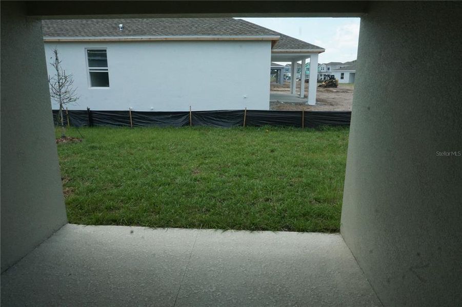 Exterior details and patio area of a home in Bridgewalk: Estate Collection, St. Cloud (Image 2). Exterior details and patio area of a home in Bridgewalk: Estate Collection, St. Cloud (Image 2).