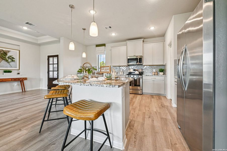 Furnished interior view inside a new home in Villas Las Flores, Floresville (Image 21).