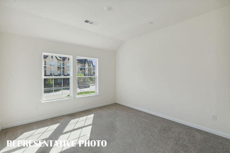 One of two spacious secondary bedrooms in our Cypress floor plan.  REPRESENTATIVE PHOTO