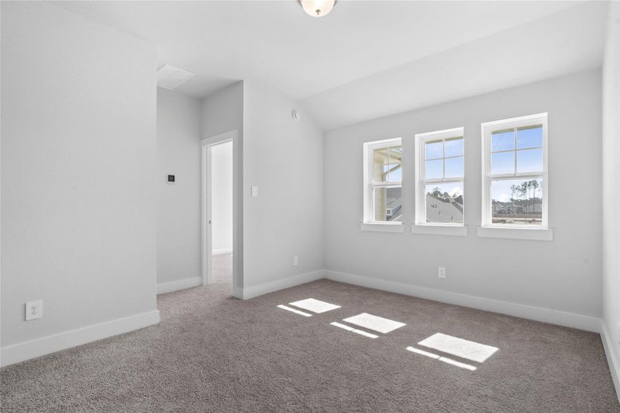 Ascend to this versatile second-floor loft, a bright and inviting space defined by its expansive feel and abundant natural light. This open loft area offers endless possibilities—envision a cozy media room, a productive home office, a vibrant play area, or a quiet reading nook—adapting easily to the buyer's needs.