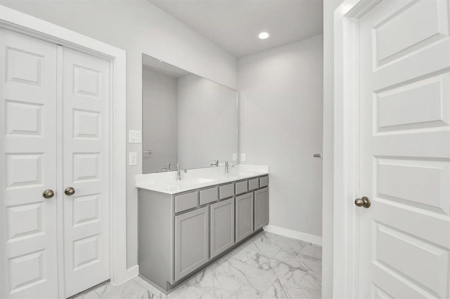 Step into a sanctuary of relaxation in your primary bathroom. Sample photo of completed home with similar floor plan. Actual colors and selections may vary.