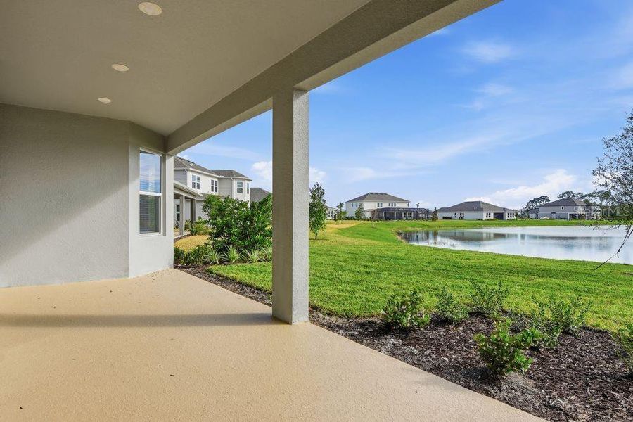 Exterior details and patio area of a home in Ardisia Park, New Smyrna Beach (Image 3).