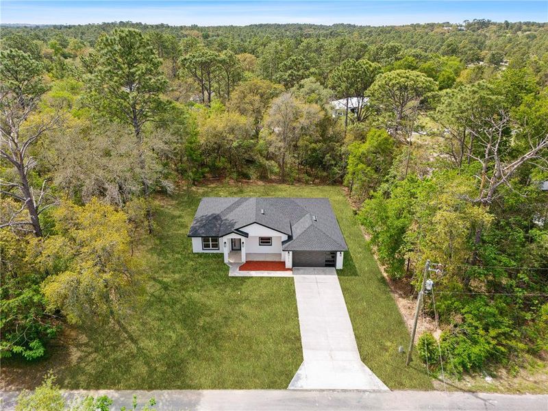 Front exterior of a new home in , Dunnellon, FL, highlighting curb appeal (Image 28).