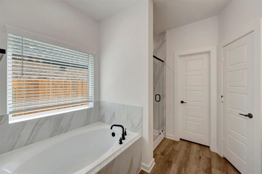 Furnished interior view inside a new home in Sorella, Tomball (Image 14).