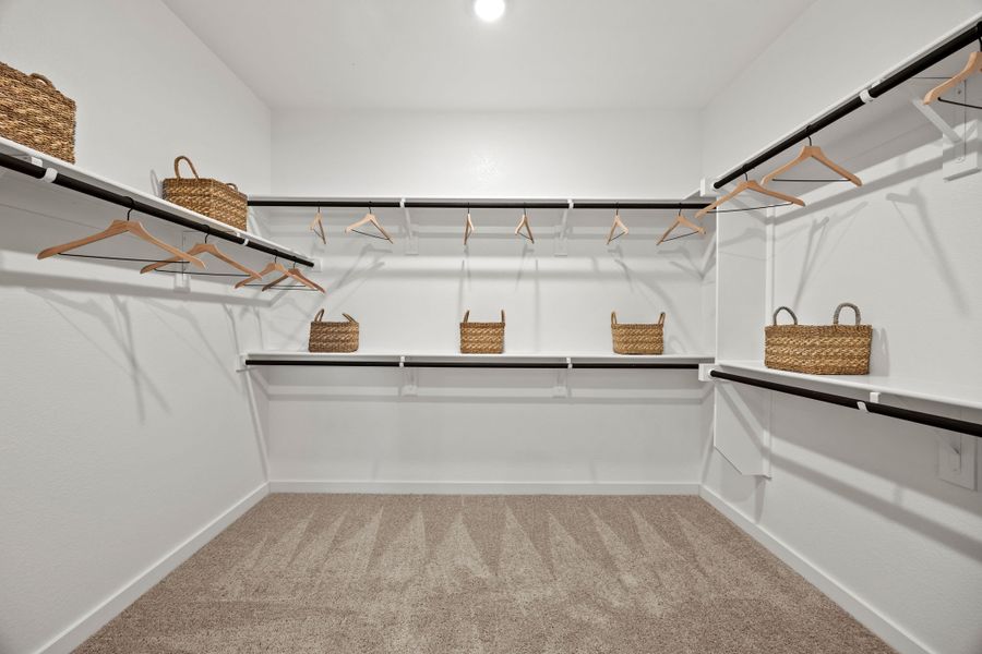 A white staircase with baskets and baskets.