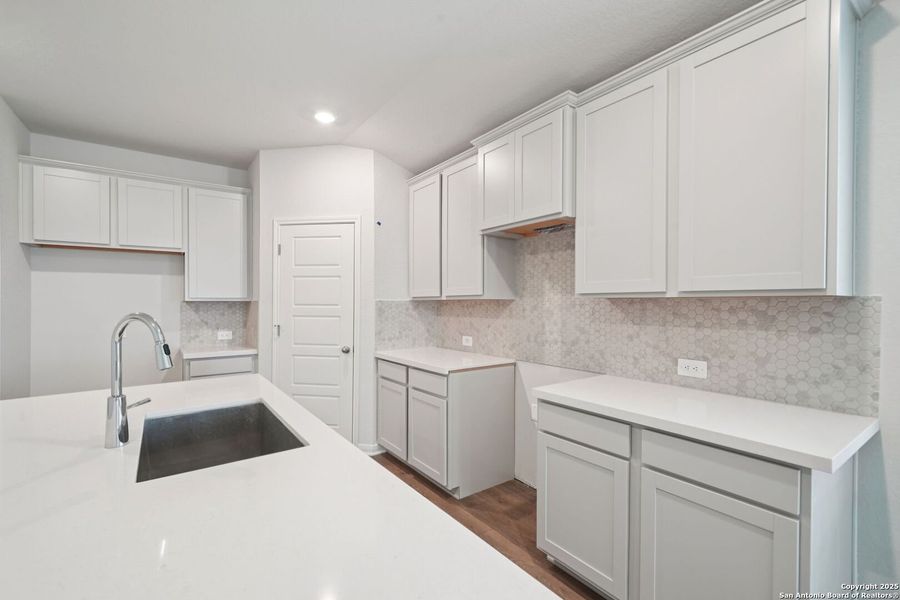 Furnished interior view inside a new home in Estancia Ranch - Premier Series, San Antonio (Image 8).