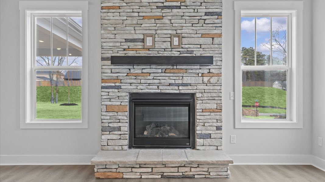 First-rate family room with eye-catching two-story ceilings and superior architectural detail