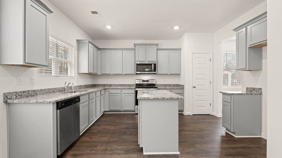 Representative furnished interior of a home built from the Packard by D.R. Horton in Evergreen Crossing, Locust Grove (Image 6).