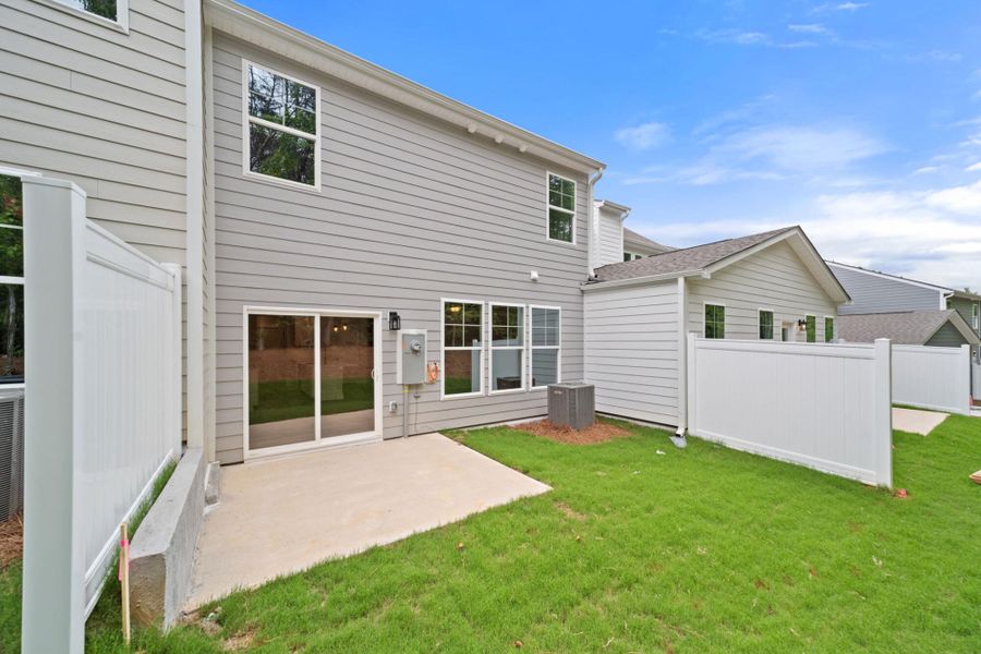 Exterior details and patio area of a home in Harbor Crossing, Greensboro (Image 2). Exterior details and patio area of a home in Harbor Crossing, Greensboro (Image 2).