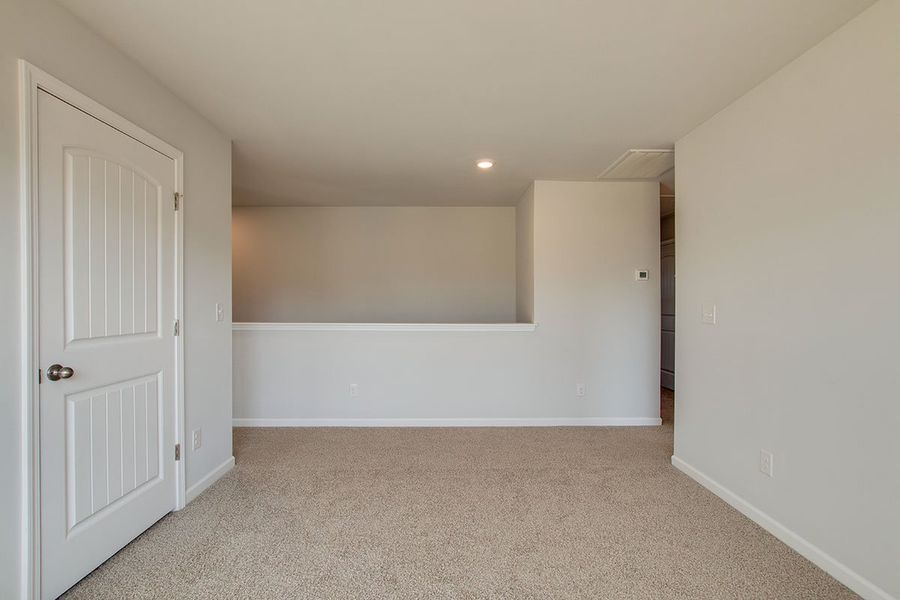 Representative unfurnished interior of a home built from the HAYDEN by D.R. Horton in The Parks, White House (Image 18).