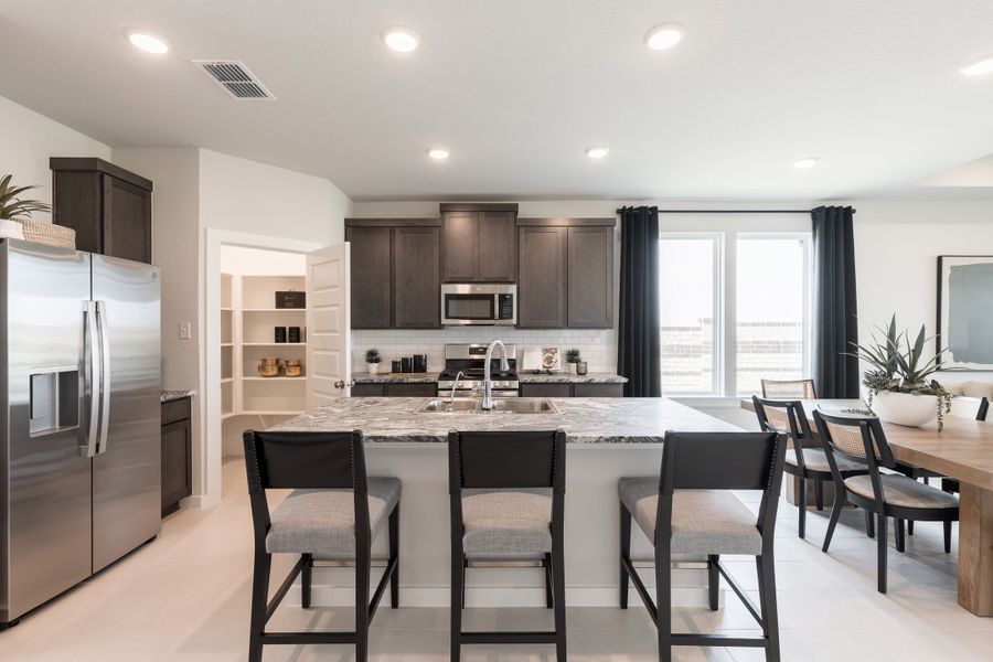 Furnished interior view inside a new home in Mason Woods, Cypress (Image 5).