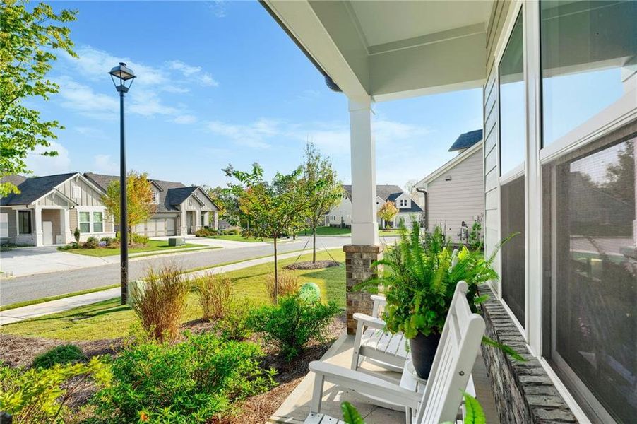 Exterior details and patio area of a home in Crescent Pointe at Great Sky, Canton (Image 4).