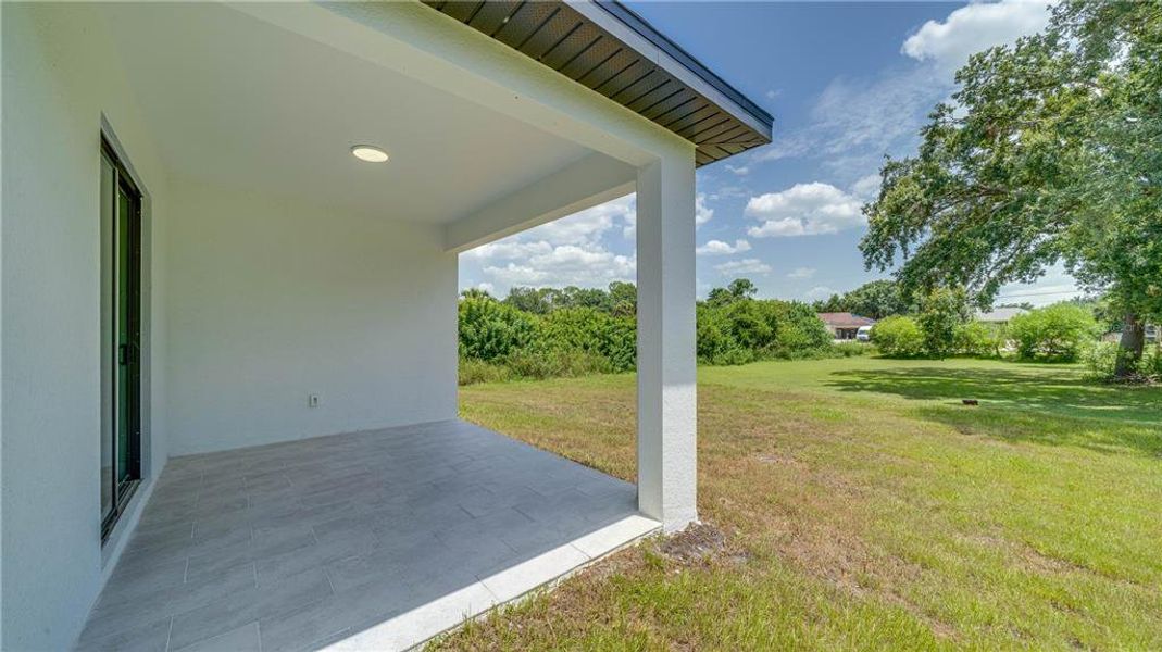 Exterior details and patio area of a home in , Lehigh Acres (Image 29). Exterior details and patio area of a home in , Lehigh Acres (Image 29).