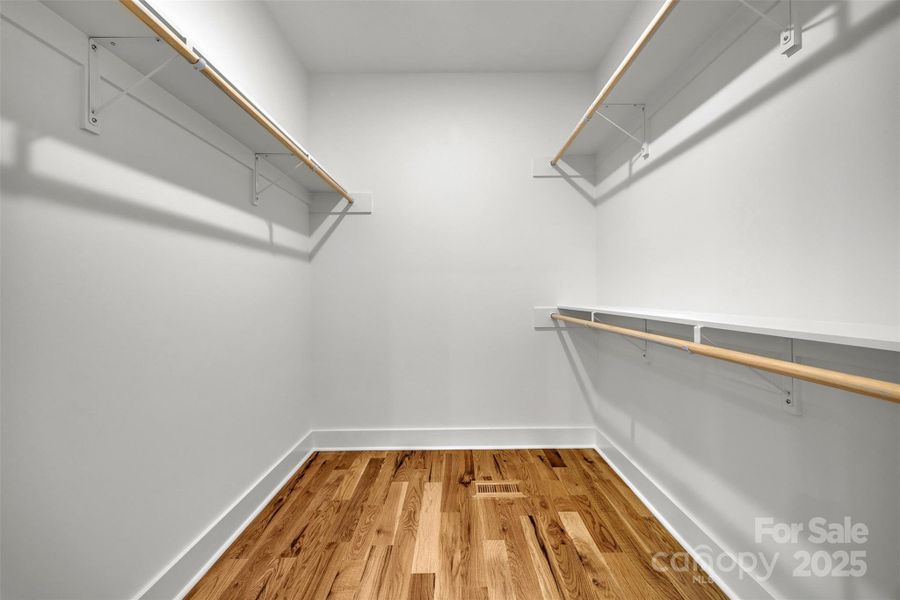 Large walk-in closet with shelving Large walk-in closet with shelving