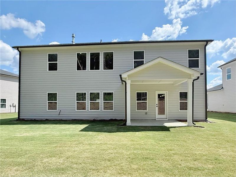 Front exterior of a new home in Vines at Mill Creek - Legacy Series, Braselton, GA, highlighting curb appeal (Image 2).