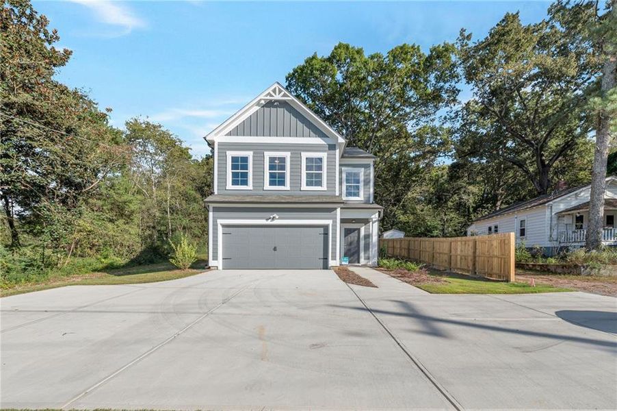 Front exterior of a new home in , Calhoun, GA, highlighting curb appeal (Image 1).