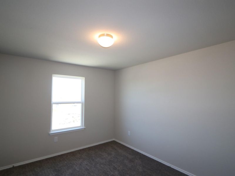 Spacious, unfurnished interior of a new home in Cascades at Onion Creek, Austin (Image 5).