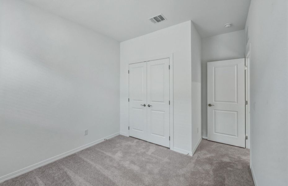 Spacious, unfurnished interior of a new home in Crosswinds, Kyle (Image 29).