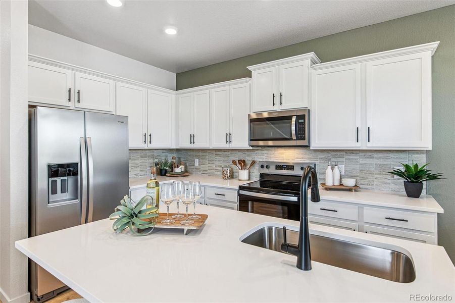 Furnished interior view inside a new home in Settlers Crossing, Commerce City (Image 25).